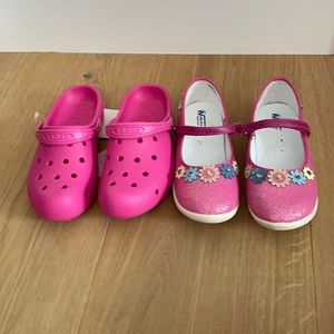 2 pairs of girls shoes.